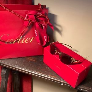 Cartier panthere sunglasses gold.